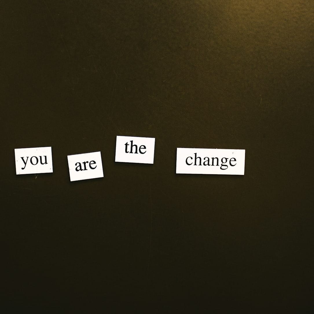 a refrigerator door with magnets that say come, the change, and come